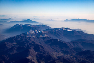 Aerial view of alps mountains covered with snow.