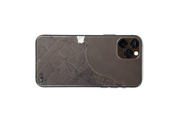 Broken lens on smartphone, isolated white background, back side, lens, camera