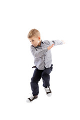 Jumping  boy of preschool age. Sport and activity. Isolated over white background. Vertical.