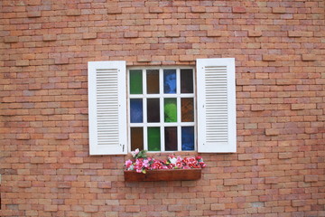 window on red brick