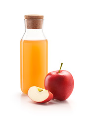 Bottle of apple cider vinegar with fresh red apples isolated on white background