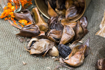 Healthy roasted black garlic isolated