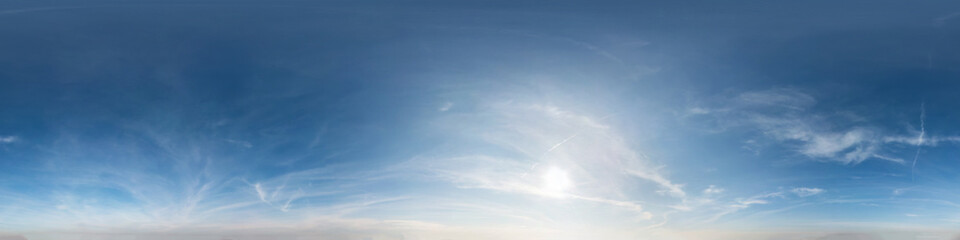 blue sky with clouds with evening sun. Seamless hdri panorama 360 degrees angle view with zenith for use in 3d graphics or game development as sky dome or edit drone shot