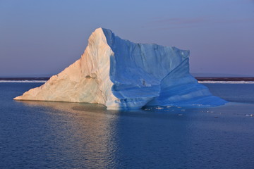 Fototapeta na wymiar Melting iceberg in Arctic ocean