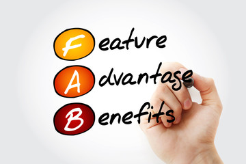 FAB - Feature Advantage Benefits acronym with marker, business concept background