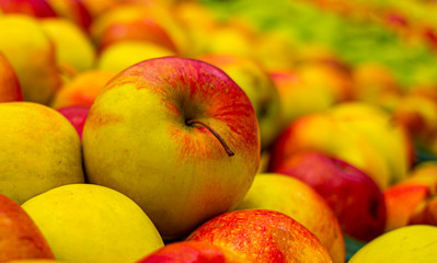 Apples close-up background. Ripe red close-up, pattern. Fruit background, veggie concept, fruit menu, healthy lifestyle
