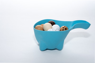 children's toy bucket for playing in the tub for kids on a white background
