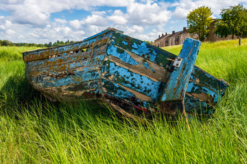 A decayed boat near the shore of the River Avon in the Pill Foreshore in Pill, North Somerset,...