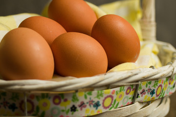 Close up of eggs  in woven basket