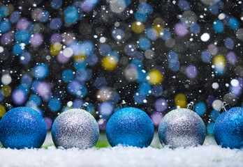 Abstract background, Christmas toys on a boke background. Happy New Year, with falling snow, bright background