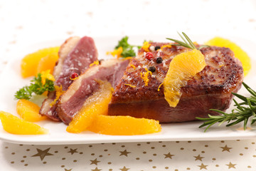 fried duck fillet and orange sauce