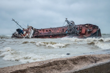 Oil leaks from cargo ship beached on Ukrainian coast. Odessa, Ukraine, November 22, 2019. An...