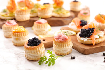 festive canape with caviar and salmon fish