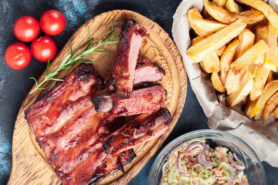 Spicy Barbecued Pork Ribs Served With BBQ