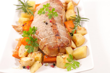 roasted beef or veal with vegetable and herbs