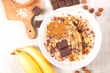 muesli, nuts, chocolate and banana, healthy breakfast