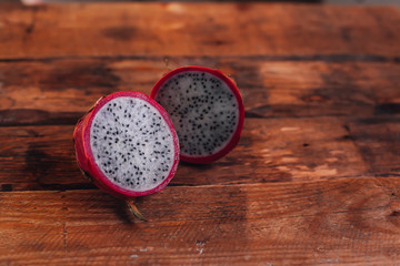 Dragon fruit on a tree background