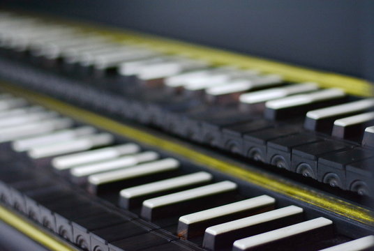 Keyboard of harpsichord (selective focus), Detail on a harpsichord keyboard. Baroque musical instrument.