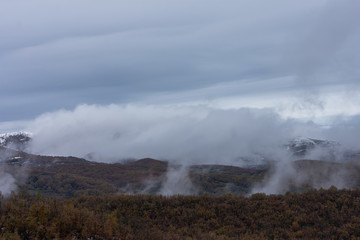 low clouds covering the view of the mountains