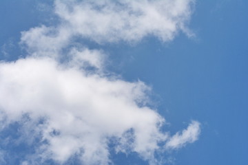 Obraz premium Blue sky with white clouds.