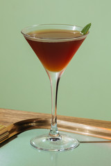 Stinger, an after dinner Cocktail with Cognac and Crème de Menthe white