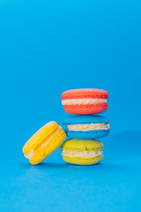 Flying macaroons with colorful backround