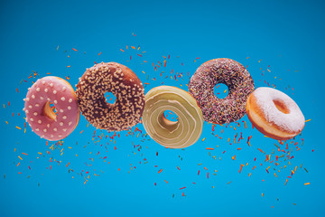 Flying donuts with colorful background