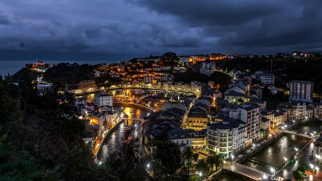Night falling over Luarca city time lapse