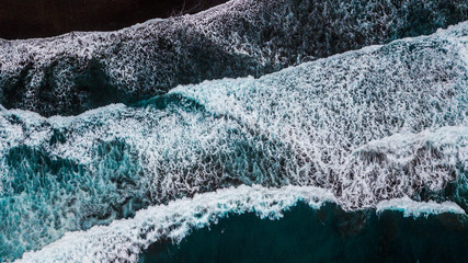 top view of a sea or ocean with waves in canary island - surfing and acuatic sports