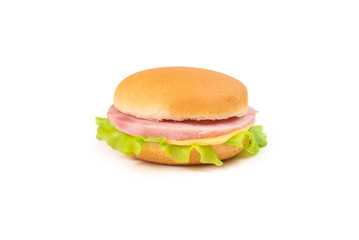 Sandwich with ham, cheese, lettuce on white background.