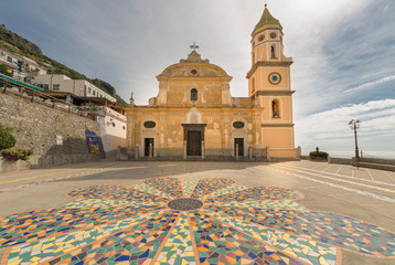 A view across the Piazza San Gennaro in in the little town, in Southern Italy Praiano, on the Amalfi coast. Church of San Luca Evangelista, Praiano, Province of Salerno, Campania, Italy.