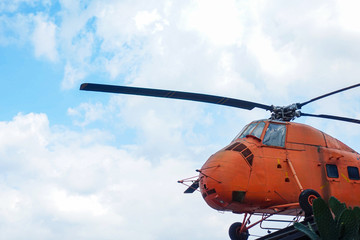 vintage orange military transport helicopter