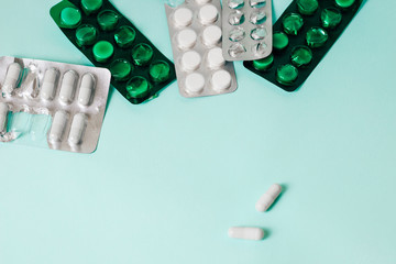 Different medicines tablets and  pills in blister pack. space for text