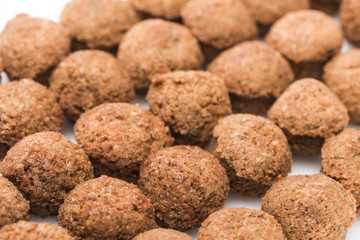close up view of fresh cooked falafel balls on white background