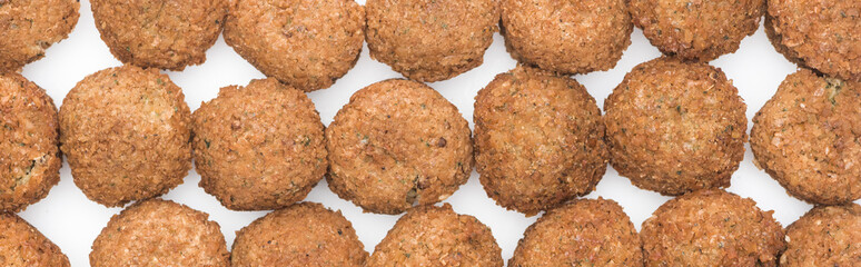 seamless pattern of delicious fresh cooked falafel balls on white background, panoramic shot