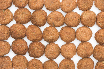 seamless pattern of delicious fresh cooked falafel balls on white background