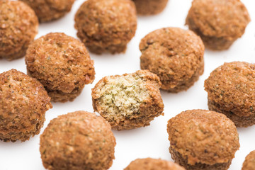 close up view of delicious fresh cooked falafel balls on white background