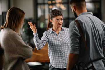 Colleagues arguing in office. Problem in team. Business people at meeting.