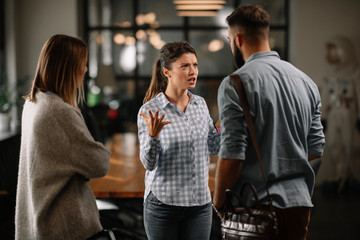 Colleagues arguing in office. Problem in team. Business people at meeting.