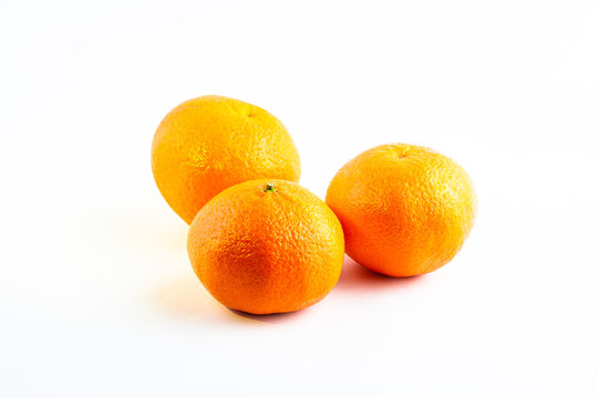 Fresh delicious juicy orange on isolated white background