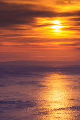 Sunset or sunrise over sea surface