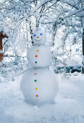 Handmade snowman in the snow outdoor