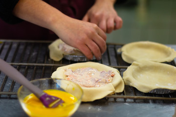 Food preparation concept action making ham cream pie with copy space