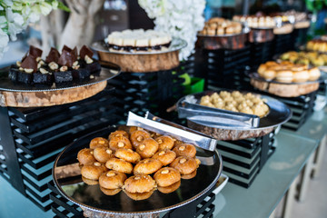 A delicious dessert buffet with various sweet bakery in a restaurant or hotel