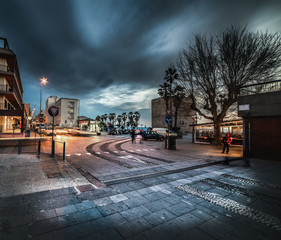 Dark clouds over Alghero seafront in the wintertime