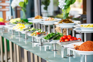 A delicious appetizer and salad buffet with various options in a restaurant or hotel
