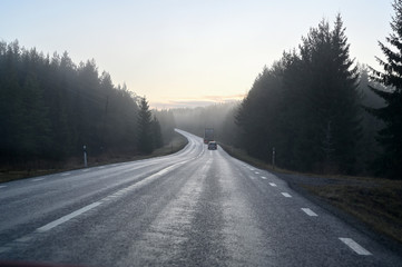 slippery morning road with poor wiew in november