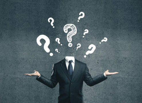 young businessman with question mark - Powered by Adobe