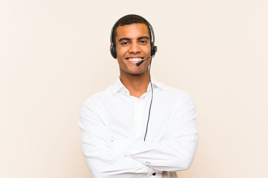 Young brunette man working with a headset