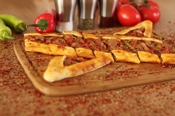 one Photo of Turkish food  pide pizza lahmacun Meat and tomatoes for Hotel & Restaurant Orders and Menu and Internet and TV